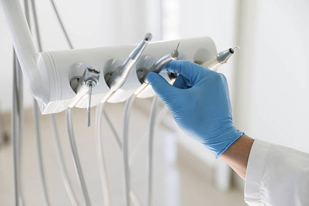 Professional Tooth Extraction technician working in Woodcreek, TX